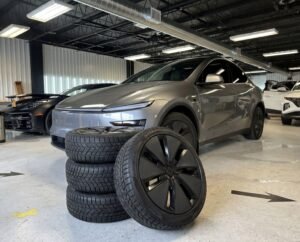 A set of premium electric vehicle tires designed specifically for Tesla models at an Ottawa service shop.